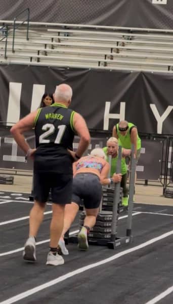 Sophia on the sled push station at the Hyrox competition.