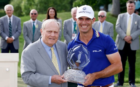 Billy Horschel of the United States with founder and host Jack Nicklaus after a win in the Memorial Tournament 2022.