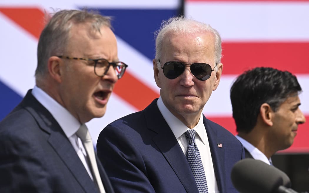 US President Joe Biden (C), British Prime Minister Rishi Sunak (R) and Australian Prime Minister Anthony Albanese (L) hold a press conference during the AUKUS summit on March 13, 2023, at Naval Base Point Loma in San Diego California. - AUKUS is a trilateral security pact announced on September 15, 2021, for the Indo-Pacific region. (Photo by Jim WATSON / AFP)