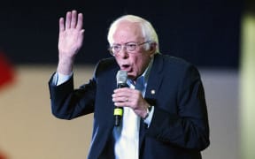 Democratic presidential candidate Vermont Senator Bernie Sanders addresses supporters during a campaign rally in Denver, Colorado.