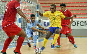 Solomon Island's Marlon Sia puts the Tongan defence under all sorts of pressure. OFC Futsal Nations Cup 2019.