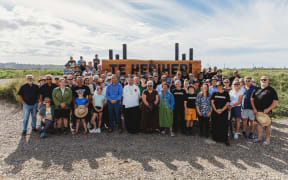 Iwi members and local stakeholders at the unveiling of the new sign restoring the name Te Heriheri to the Waihī estuary.