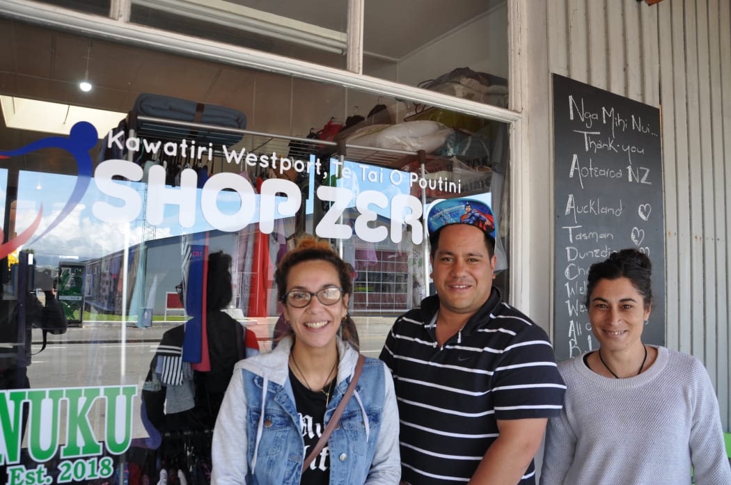 Mikaere Clarkson-Steele with Shop Zero volunteers outside the Westport store.