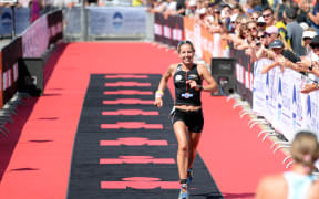 Amelia Watkinson at the finish line of Ironman70.3 Asia-Pacific Championship in Auckland in 2015.