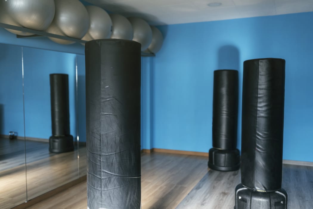 Boxing gym room ready for class, nobody. Fitness training