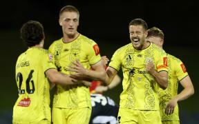 Scott Wootton of the Phoenix celebrates victory on the final whistle during the A-League Men round 17 match between Macarthur FC and Wellington Phoenix.