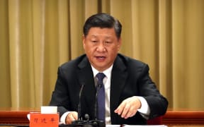 China's President Xi Jinping speaks during an event to commemorate the 40th anniversary of the Message to Compatriots in Taiwan at the Great Hall of the People in Beijing.