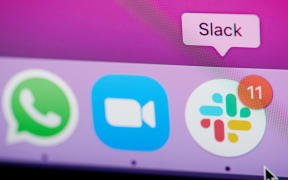 New york, USA - February 25, 2021: Slack app for work message  on laptop screen close up view