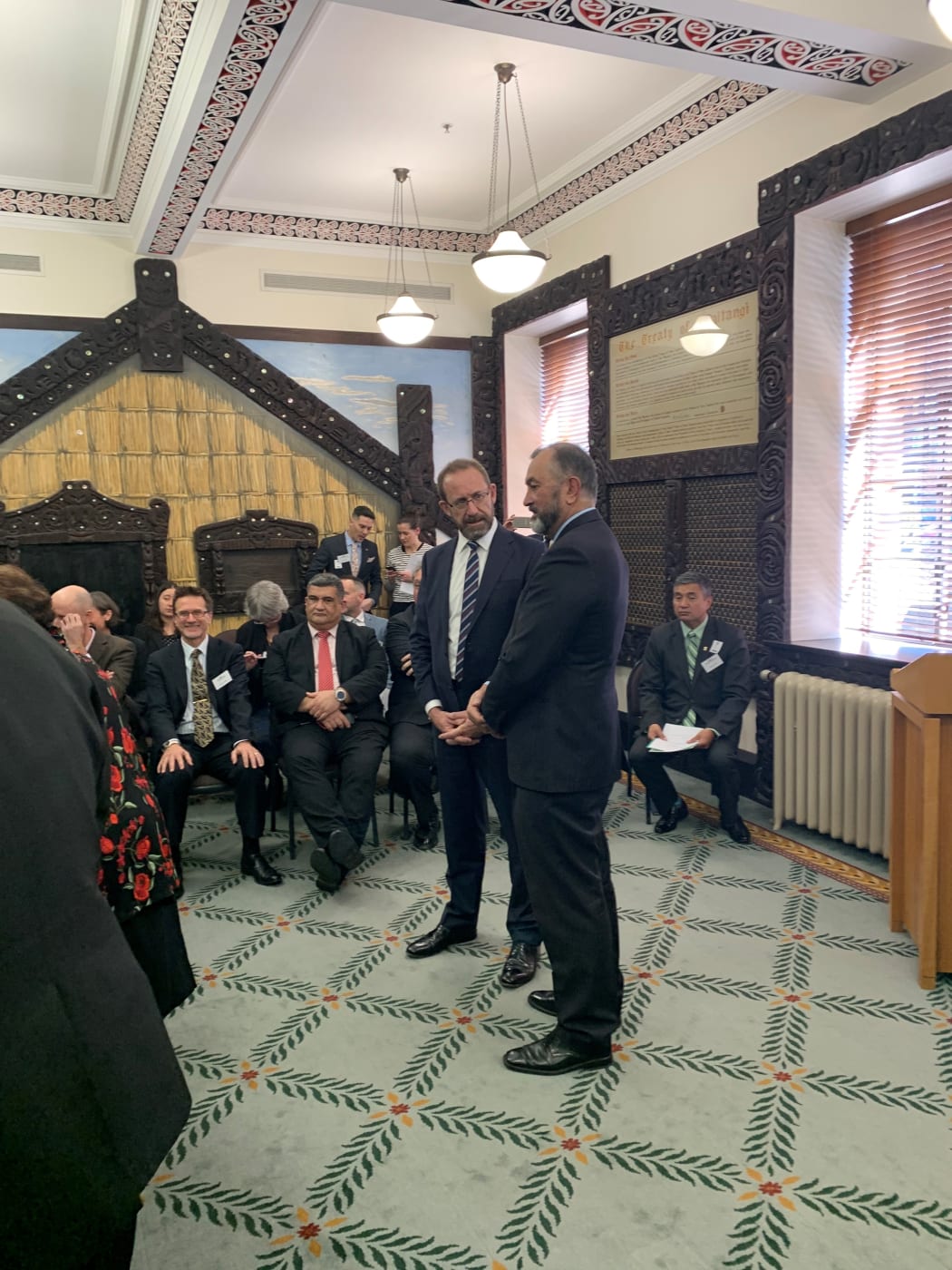 Andrew Little speaking with Moriori chief negotiator Maui Horomona.