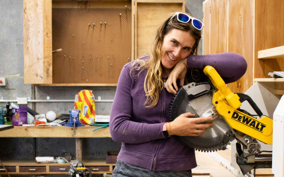 Jade Musther stands in the Cahoots Workshop.