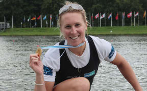 New Zealand's Emma Twigg with World Championship gold, Amsterdam, 2014.
