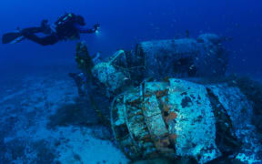 A diver inspects the wreck of 454 Squadron Baltimore FW282 in the Aegean Sea near Antikythera Island, Greece.