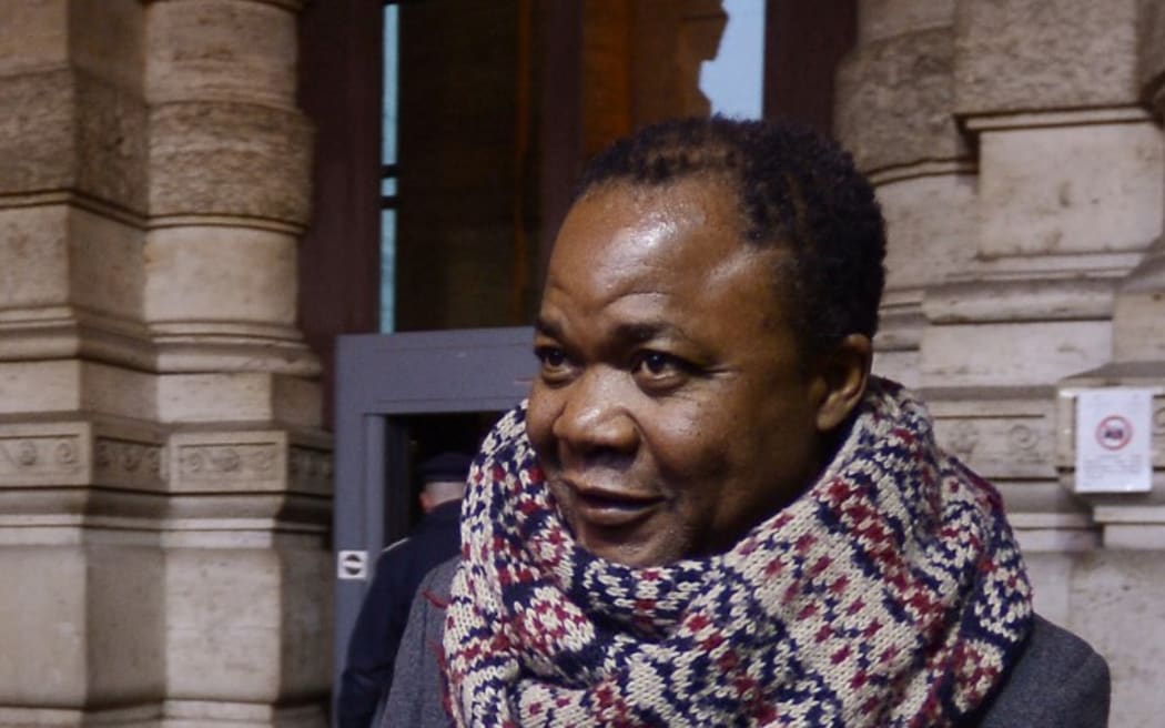 Patrick Lumumba, a bar owner who was originally jailed for the murder of Meredith Kercher, leaves the Italy's Supreme Court in Rome on March 25, 2015. The court will examine the verdict that found Raffaele Sollecito and his former lover American Amanda Knox guilty of killing British student Meredith Kercher in the Italian university town of Perugia in 2007, in a case that has captivated the world with its sub-texts of drugs, alleged sexual debauchery and police bungling.      AFP PHOTO / FILIPPO MONTEFORTE (Photo by FILIPPO MONTEFORTE / AFP)