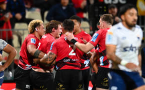 The Crusaders celebrate Ethan Blackadder's try during the Super Rugby Pacific match against Moana Pasifika, at the Apollo Projects Stadium.