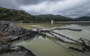 Mangatawhiri Dam in Hunua with the discolouration caused by sediment after the deluge from storms a few weeks earlier.