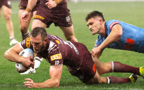 Kurt Capewell of the Maroons scores a try during the State of Origin game two in Perth, 2025.