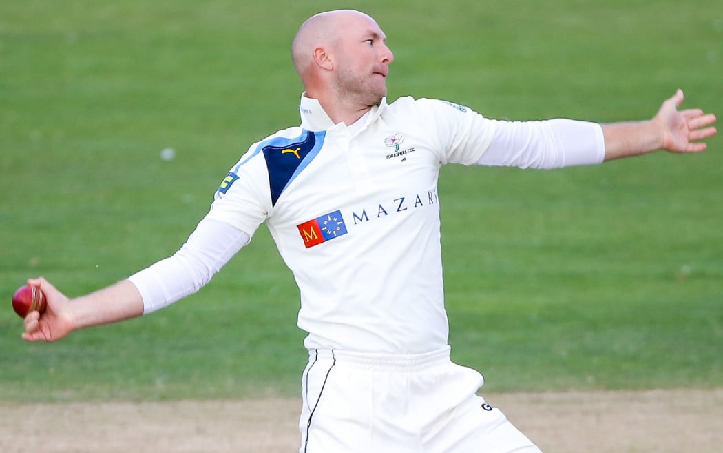Adam Lyth delivers the ball for Yorkshire, 2014