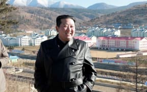 This undated picture released from North Korea's official Korean Central News Agency (KCNA) on November 16, 2021 shows North Korean leader Kim Jong Un (R) visiting Samjiyon city.