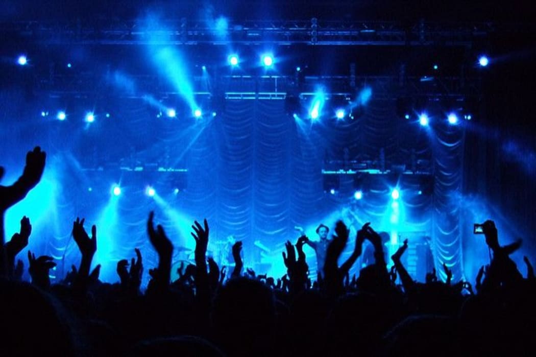 Hands in the air in concert