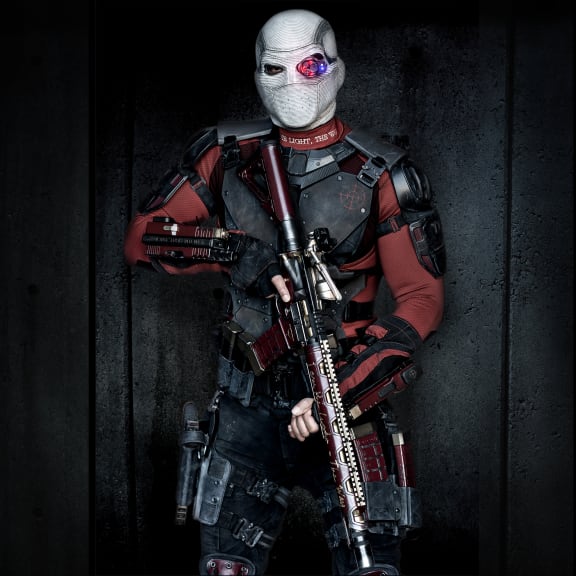 Will Smith as Deadshot in a costume designed by Kate Hawley for David Ayer‘s Suicide Squad