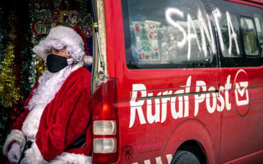 Rural courier Jennifer Orr-Havill has decked out her van in tinsel for some Christmas spirit.