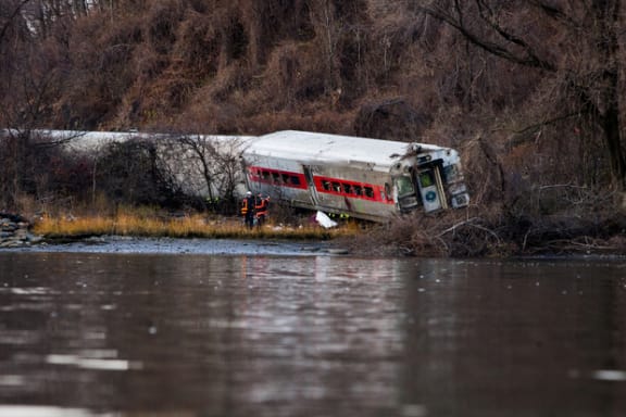 NY commuter train wreckage after derailment.