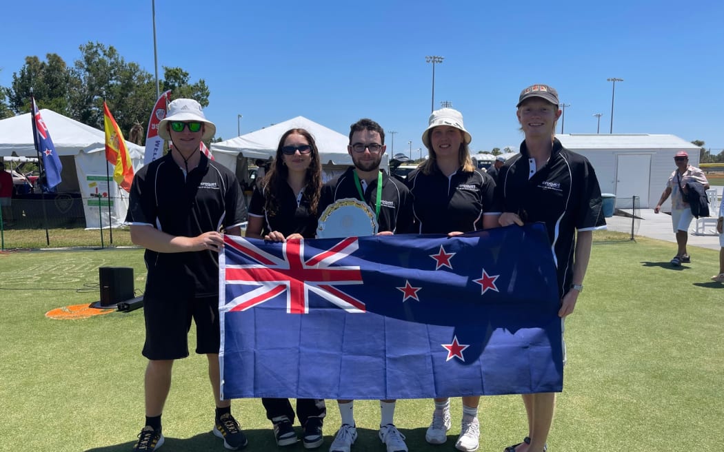 Image is a photograph of the five New Zealand players who played at the 2025 U21 GC World Championship.