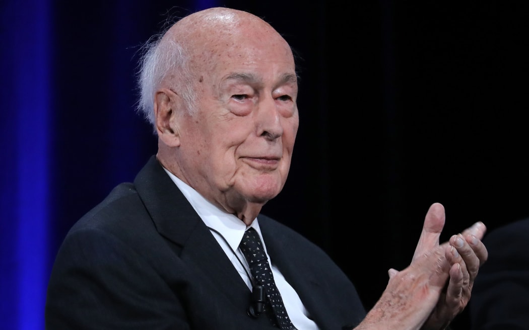 (FILES) In this file photo taken on June 20, 2019 Former French President Valery Giscard d'Estaing applauds at the conference of the 50th anniversary of the election of Georges Pompidou to the Presidency of the Republic