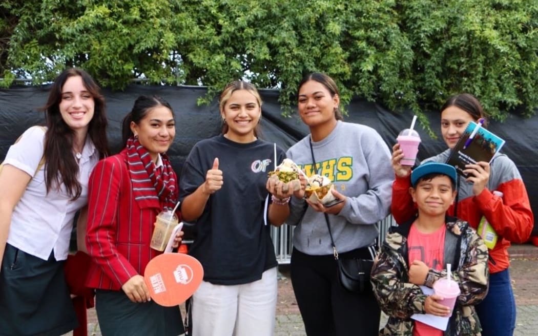 Westlake Girls' supporters stop for a Poly snack - day 2 Polyfest 2021