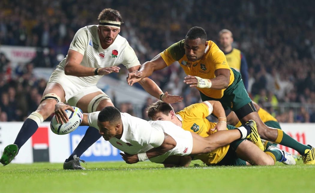England winger Anthony Watson scores against Australia at Twickenham.