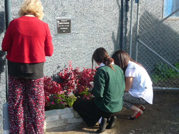 The garden was blessed at the memorial service.