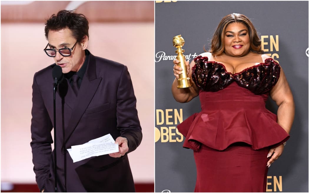 Robert Downey Jr. (left) and Da'Vine Joy Randolph (right) accept Golden Globes for best supporting actor and actress in a movie at the 81st Golden Globe Awards held at the Beverly Hilton Hotel on January 7, 2024 in Beverly Hills, California.
