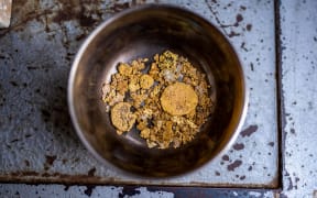 A bowl of gold nuggets. Photographer: Simon Marks/Bloomberg