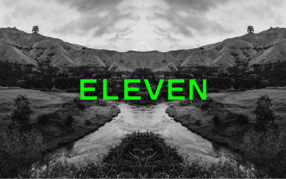 Podcast episode image for the 'Mr Lyttle Meets Mr Big' podcast. A moody black and white landscape photograph of the Whanganui river is mirrored vertically creating a Rorschach like effect with the episode number 'ELEVEN' overlaid in vibrant green.