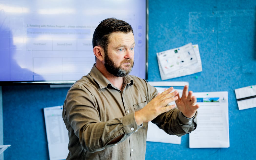 Phillip King, a teacher at Oranga School, working in the classroom that he leads with 9 and 10 year old students.