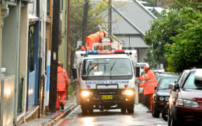 SES crew work to repair a damaged house in Sydney's inner west on Tuesday.