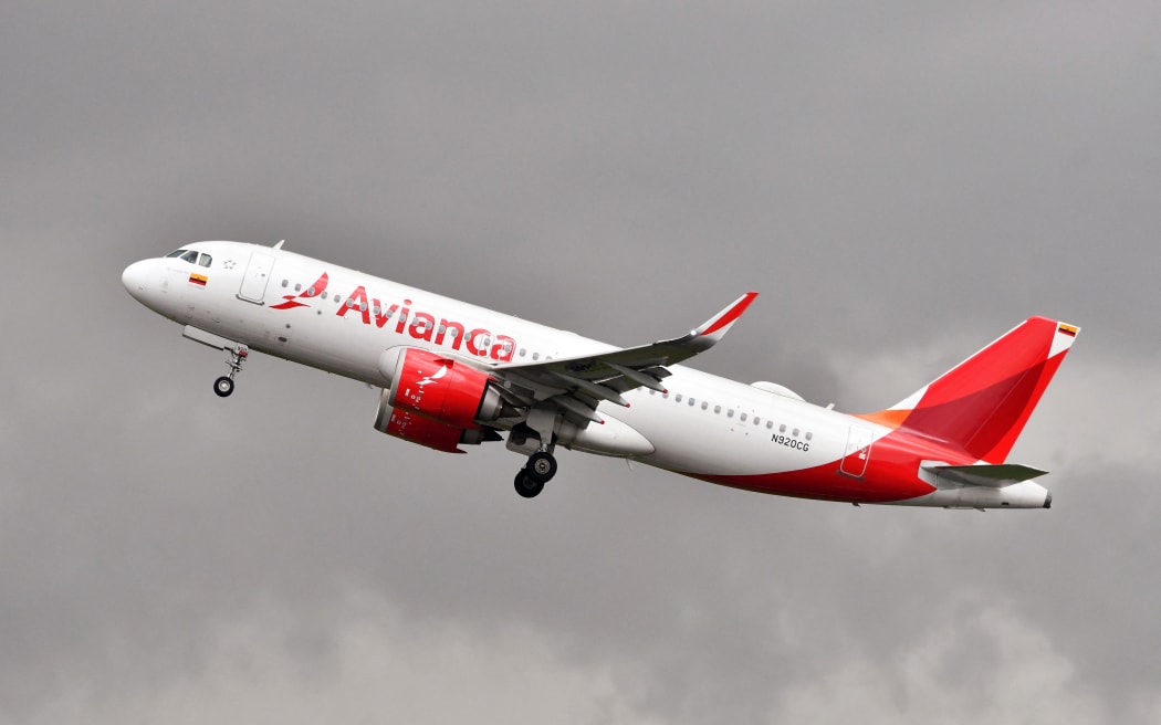 An Avianca plane takes off from El Dorado International Airport in Bogota, on May 14, 2022. (Photo by DANIEL MUNOZ / AFP)