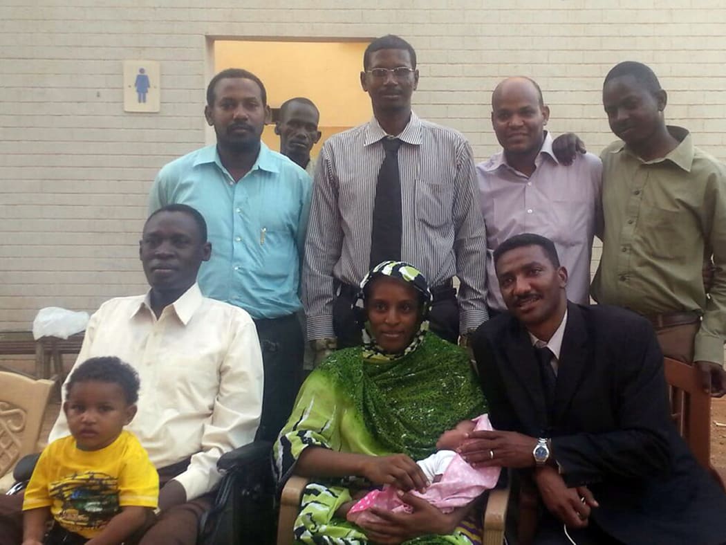 Meriam Ibrahim with her family and legal team after her release.