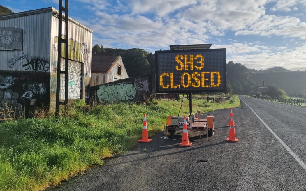 A sign advises SH3 is closed.