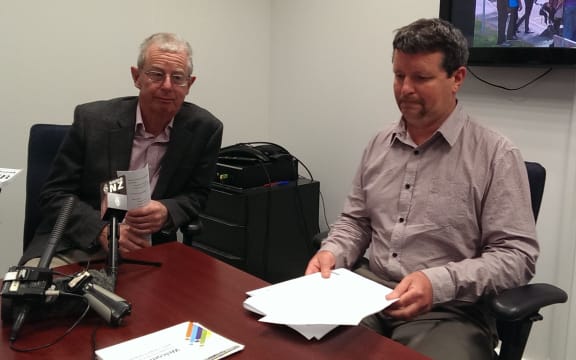 The regional council's commissioner Rex Williams, left, and public transport manager David Stenhouse.