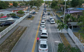 The queue to receive unemployment application papers in the city of Hialeah, Florida, 8 April.