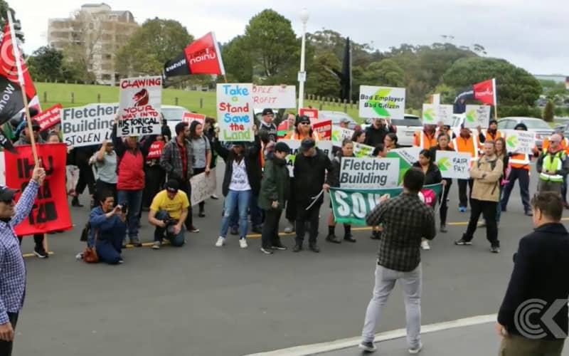 Protest outside Fletcher meeting as profit forecast slashed