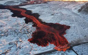Lava flows in Iceland after the latest eruption in Grindavík on February 8, 2024.