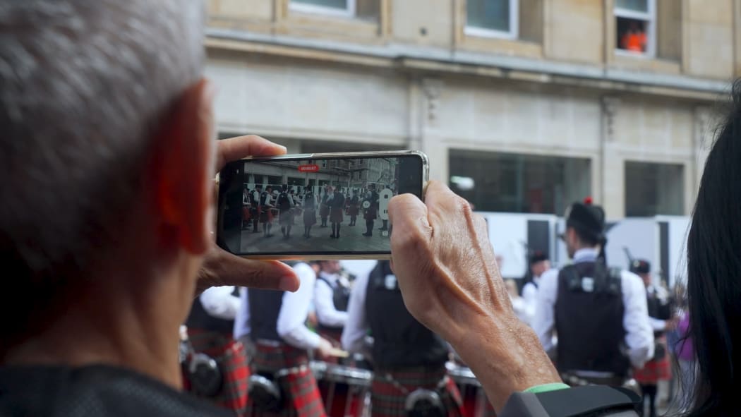 The Canterbury Caledonian Society being filmed on Buchannon Street