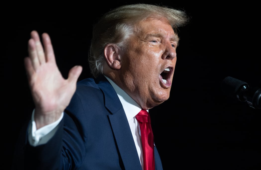 US President Donald Trump holds a Make America Great Again rally as he campaigns  in Orlando on 12 October