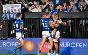Marcelo Montoya of the Warriors celebrates a try.