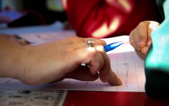 Teacher and student at Linwood Primary School, Christchurch.