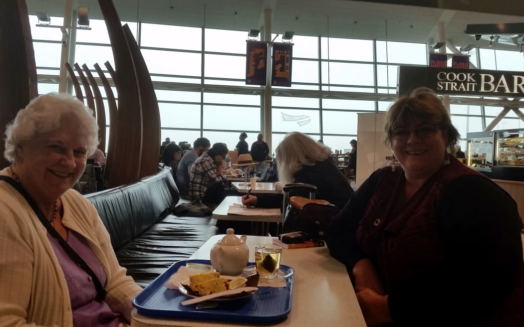 Stranded travelers Marguerite Andersen (left) and Chris Knight in Wellington Airport.