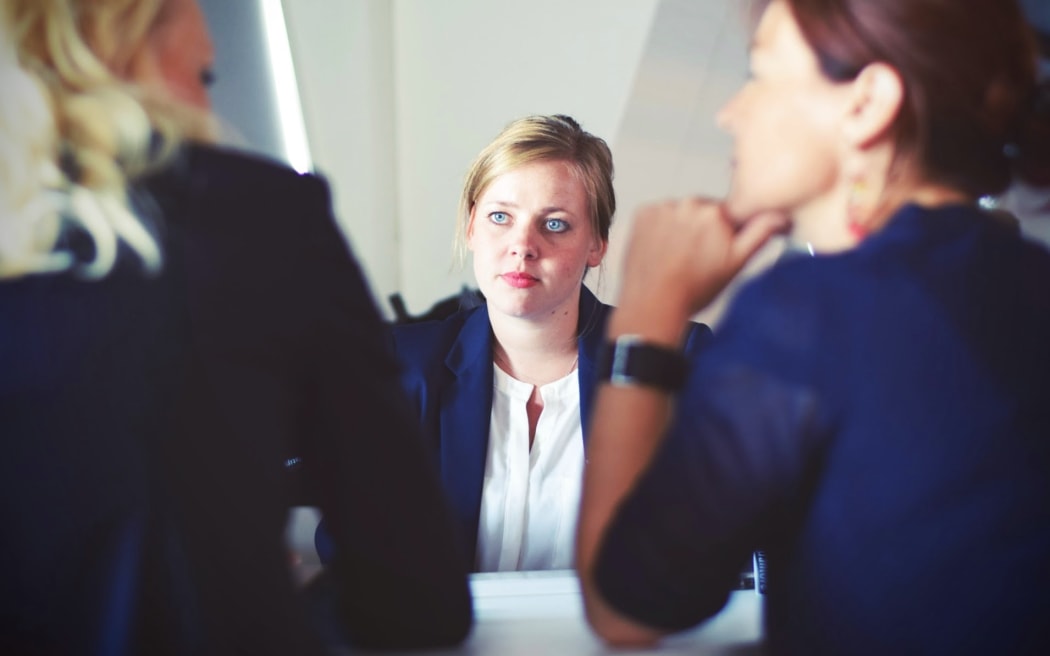 Woman in interview scene