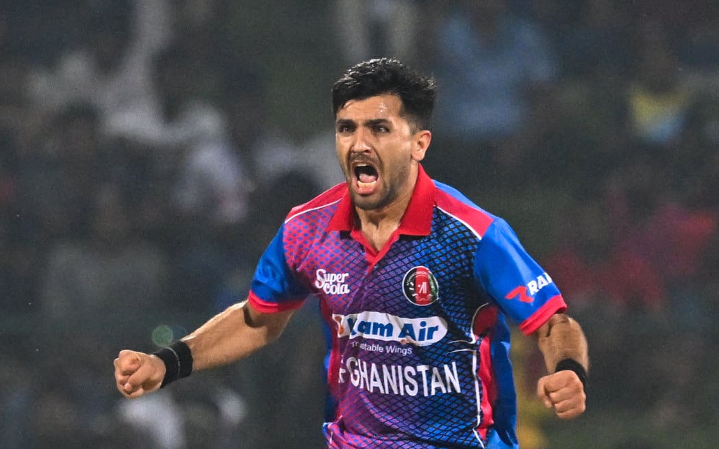 Afghanistan's Fazalhaq Farooqi celebrates after taking the wicket of Sri Lanka's Pathum Nissanka during a one-day international match between Sri Lanka and Afghanistan on November 25.